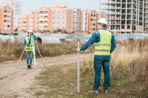 land surveyors measuring